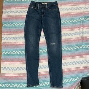 Levi’s 311 Shaping Skinny blue distressed jeans